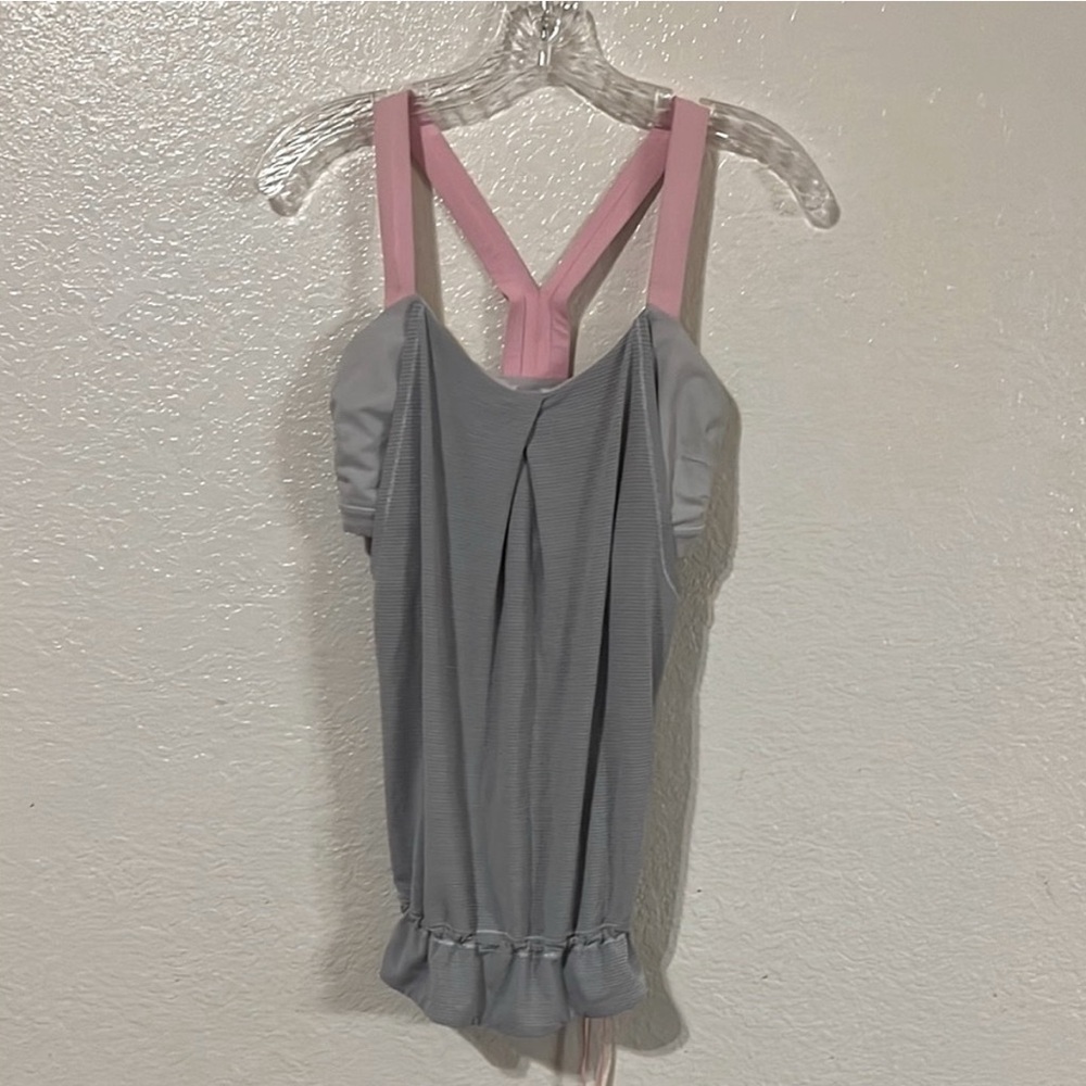 Lululemon Athletica Gray and Pink Tie Waist
Ruffled Tank Top Size 6